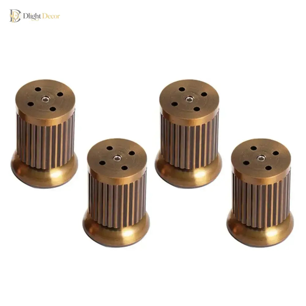 Four adjustable antique copper furniture legs of different heights with mounting holes