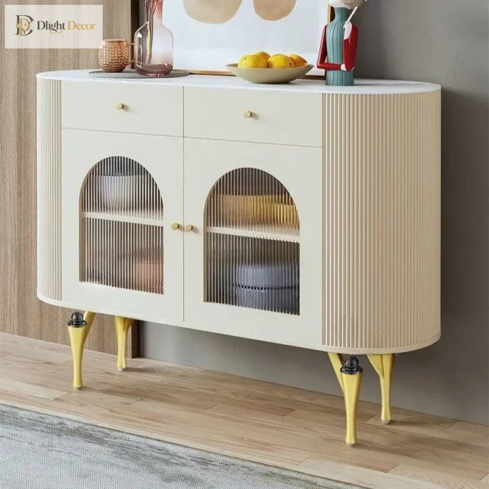 Cream cabinet with two-tone metal legs, gold legs with dark mounting caps