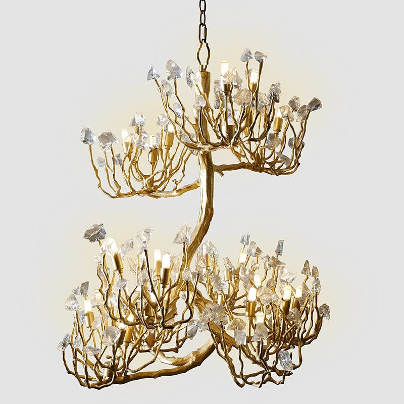 Semi-flush crystal chandelier with gold-toned branching arms and clear crystal drops