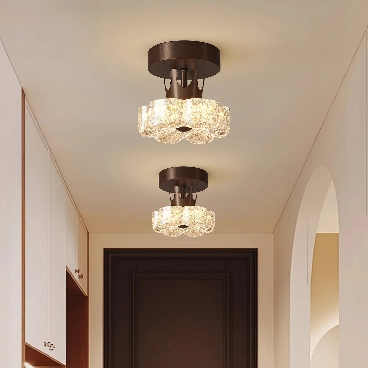 Brown flush-mount LED ceiling light with frosted glass shades in hallway ceiling