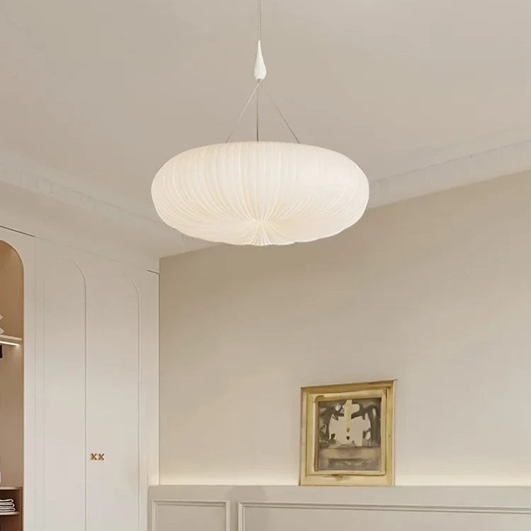 Cream ribbed dome pendant light with white canopy and hanging rod