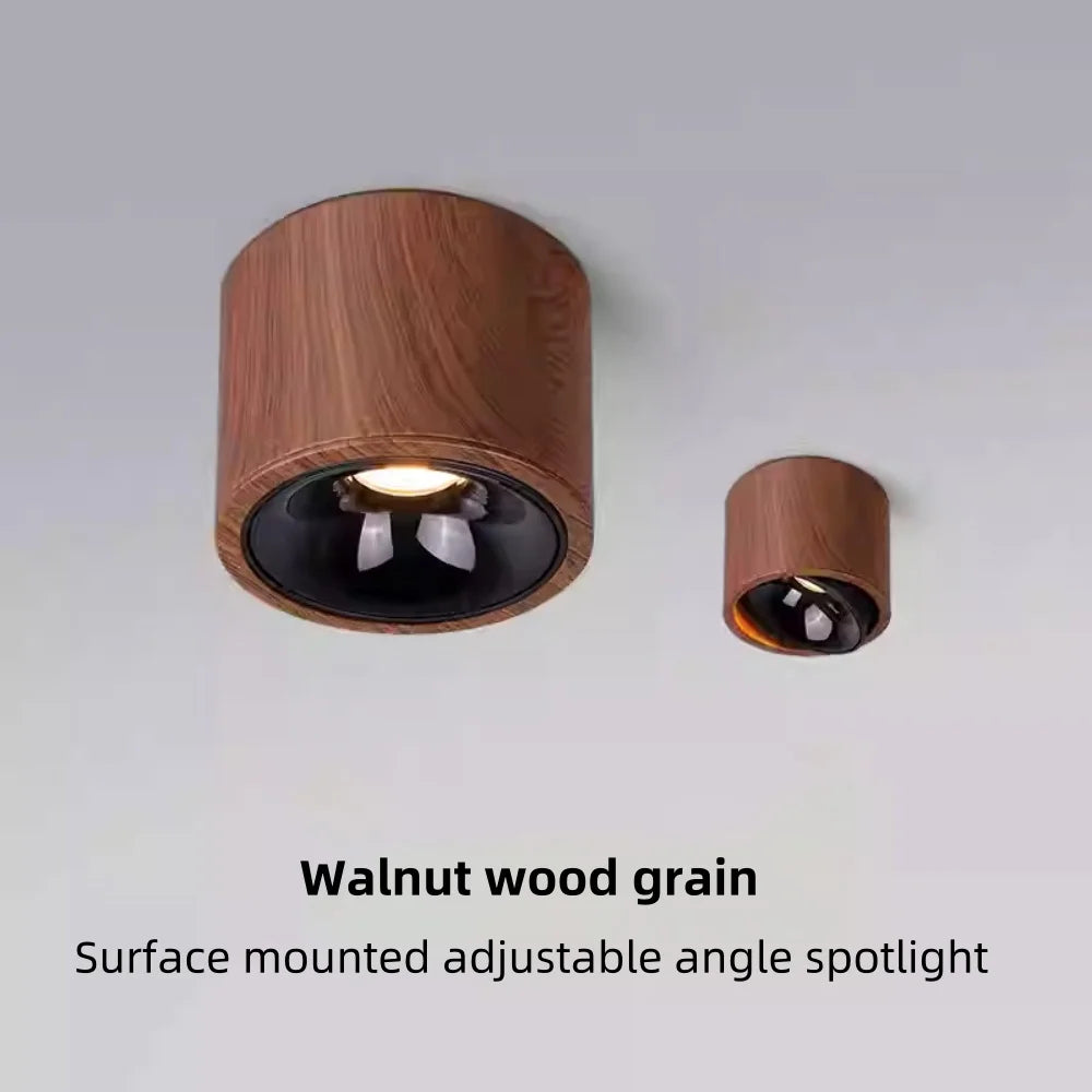 Walnut wood-grain adjustable LED surface spotlight, dark lens with chrome reflector