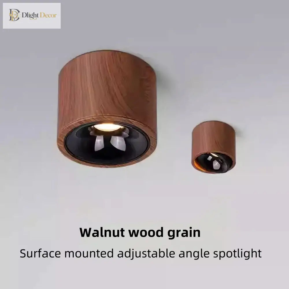 Walnut wood-grain adjustable LED surface spotlight, dark lens with chrome reflector