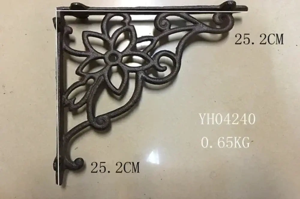 Cast iron right-angle shelf bracket with star flower scroll ornament, dark finish