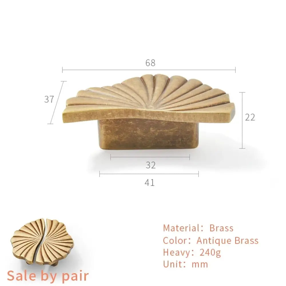 Antique brass ruffled cabinet handle with size dimensions; sale by pair label shown.