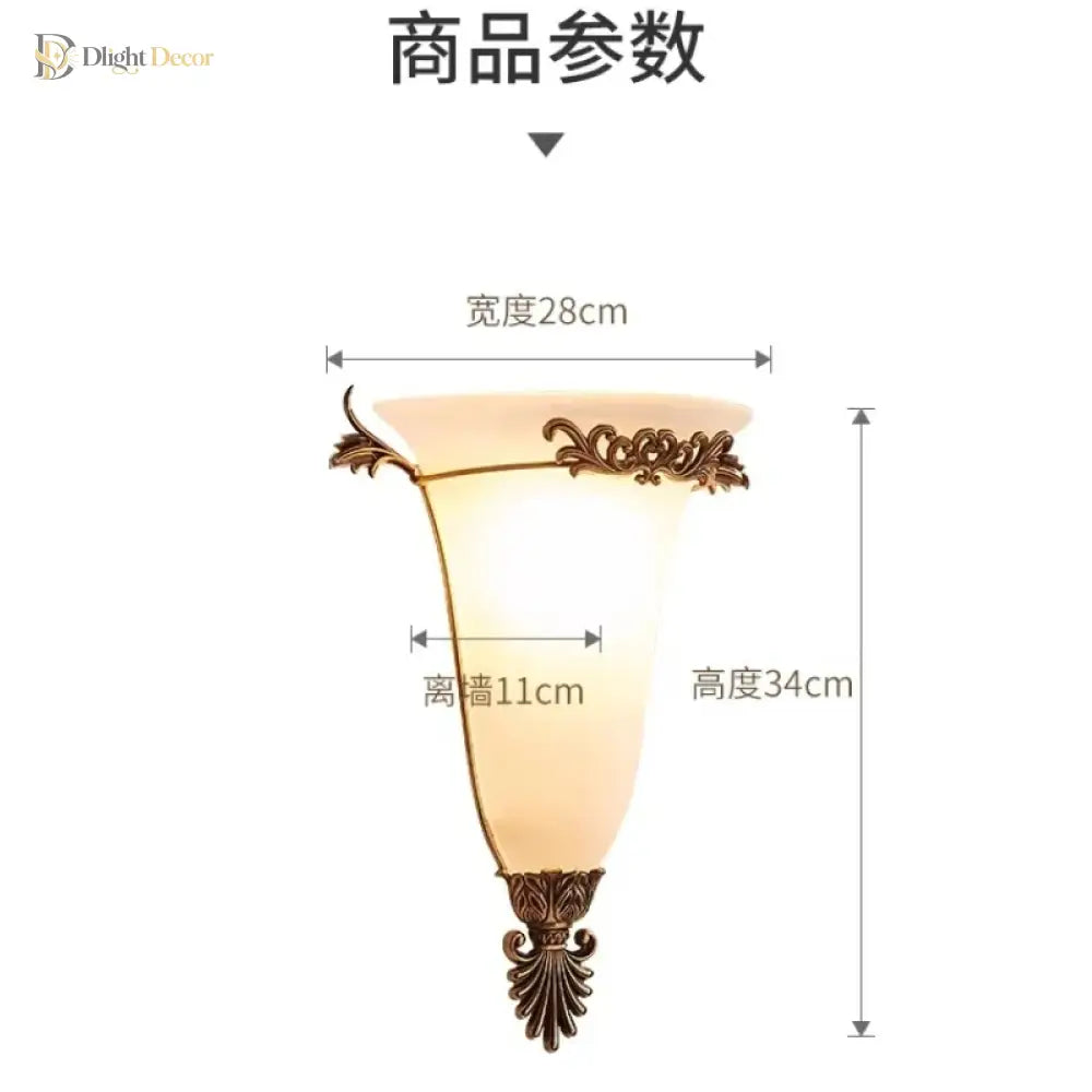 Gold retro wall sconce with frosted glass shade and floral metal finial