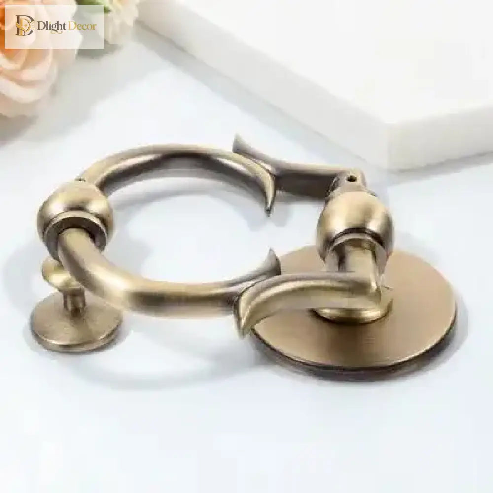 Brushed bronze door knocker handle with curved loop, two mounting posts and round base