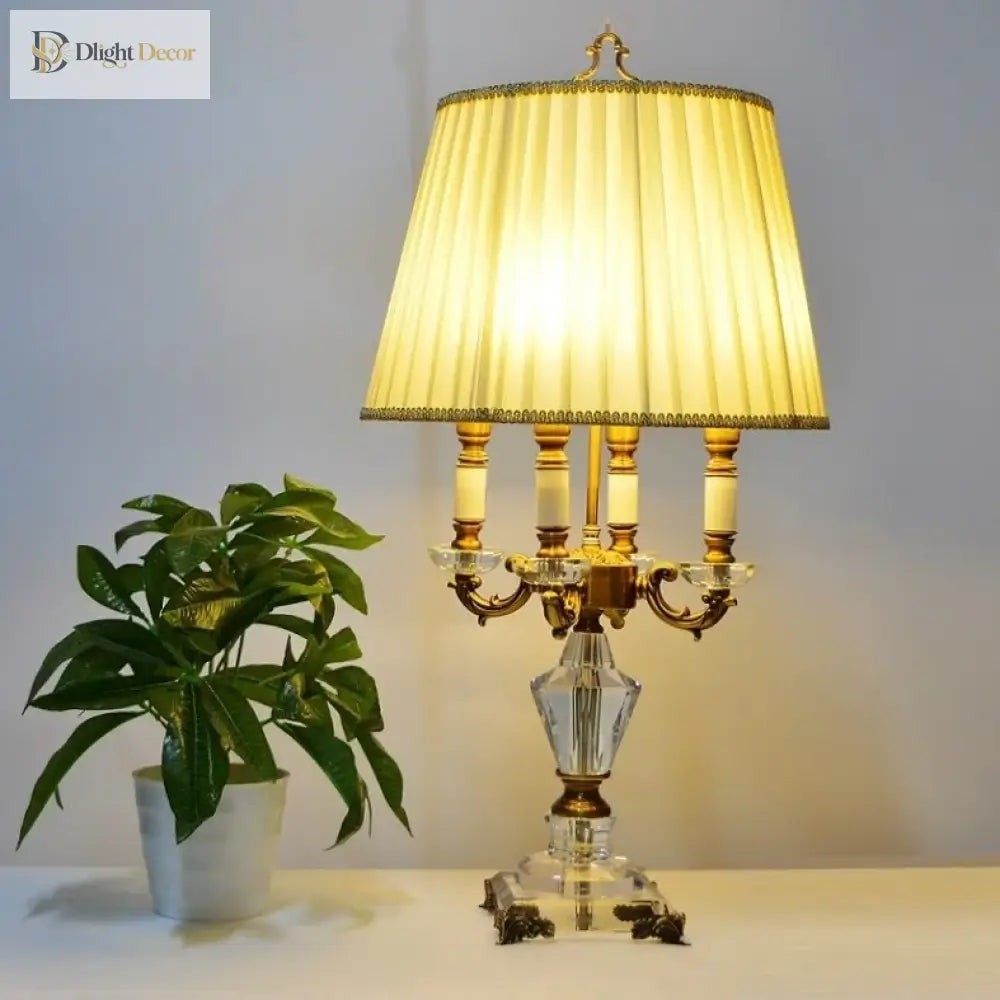 Modern fabric LED desk lamp with warm yellow pleated shade and gold-tone base