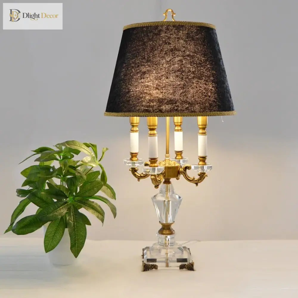 Modern fabric LED desk lamp with black fabric shade and gold-tone base