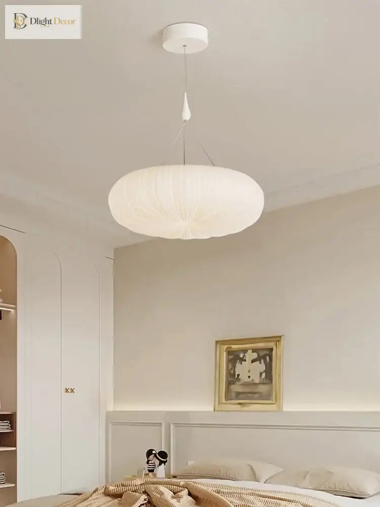 Cream ribbed dome pendant light with white canopy and hanging rod