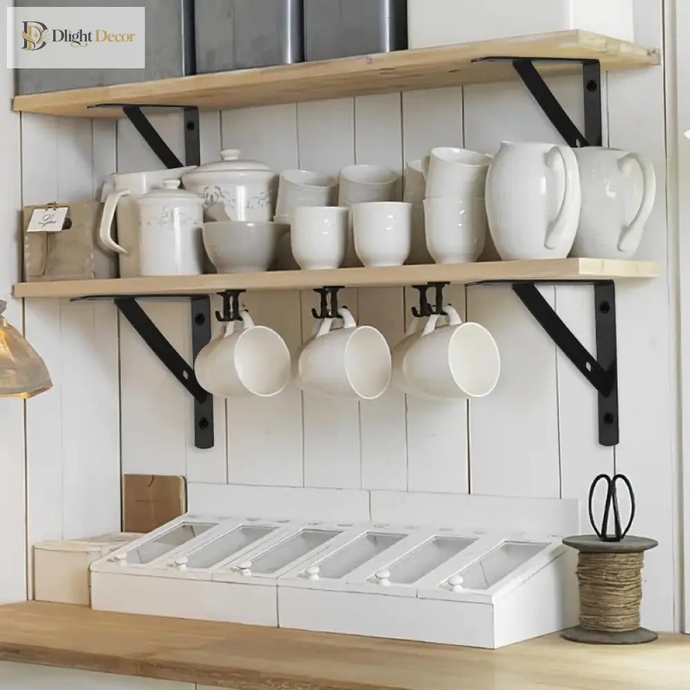 Black metal L-shaped wall shelf brackets holding a row of mugs under a shelf
