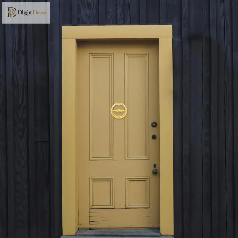 Gold ring door knocker centered on light front door