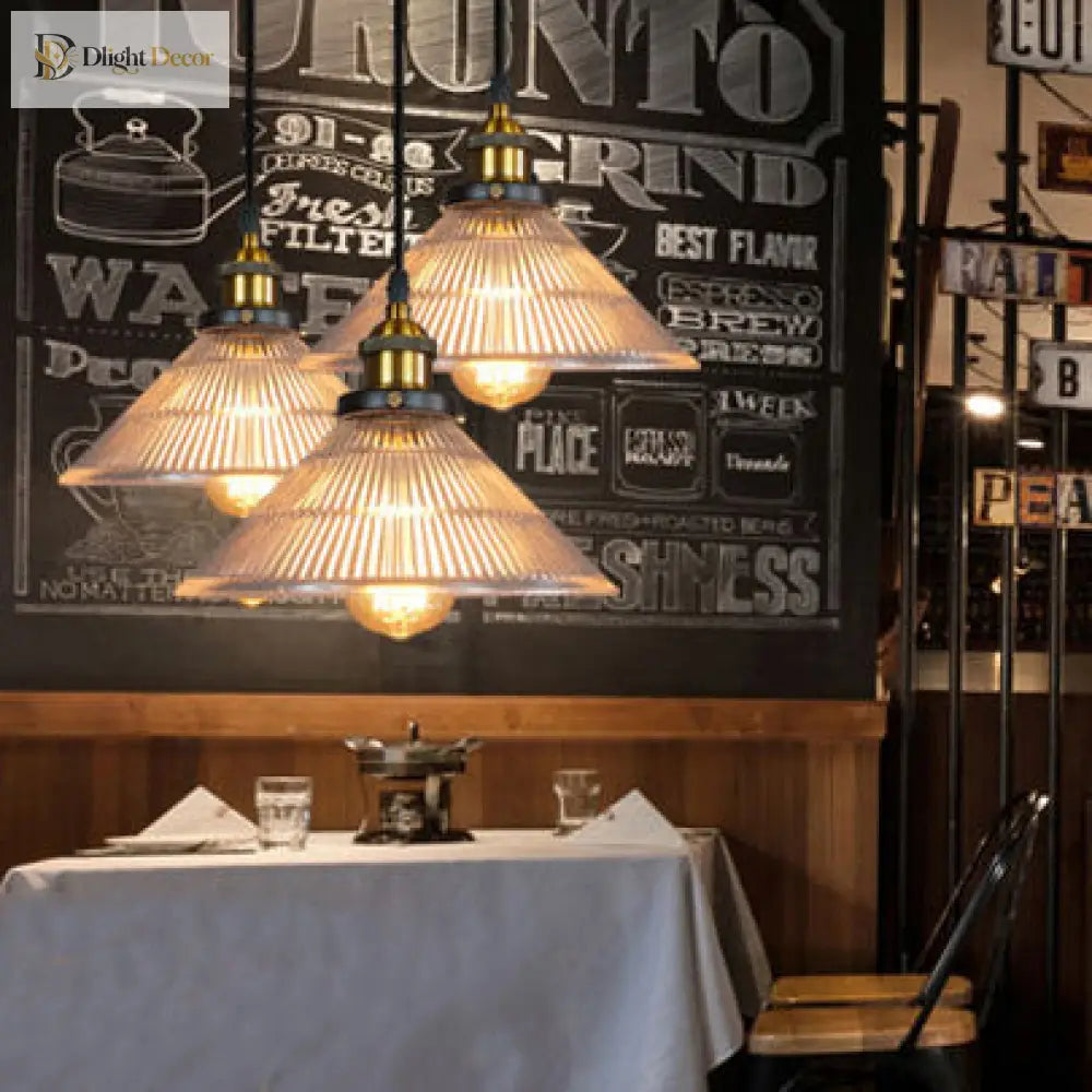 Illuminate Your Dining Room With Industrial Elegance: The 3 - Light Brass Cone Pendant Ribbed Glass