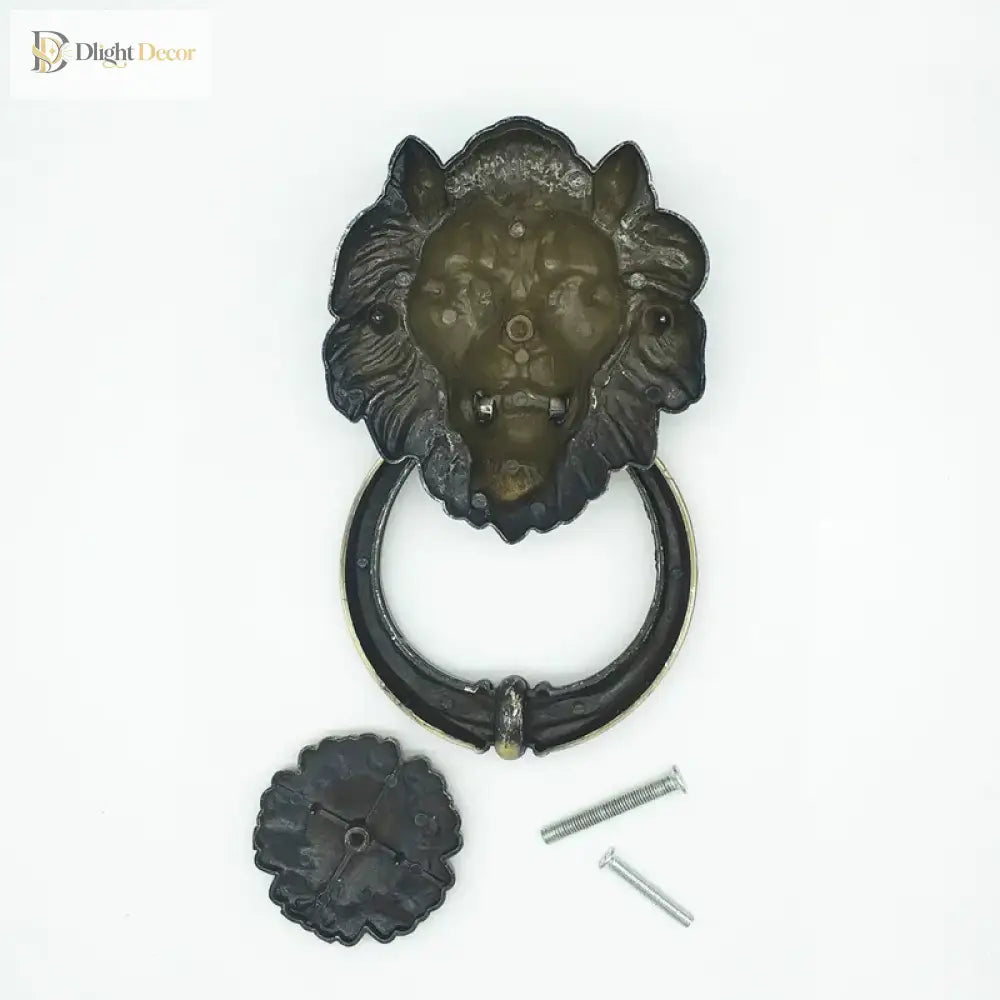 Dark metal lion head door knocker with arched ring and mounting hardware