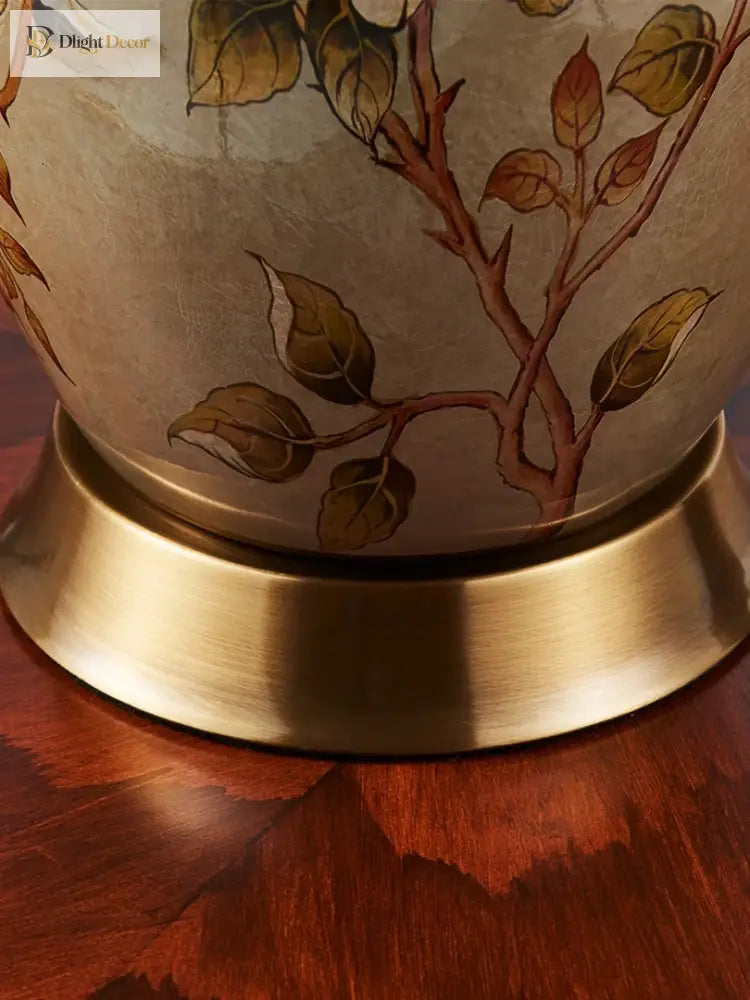 Bottom view of ceramic table lamp base with gold metal rim