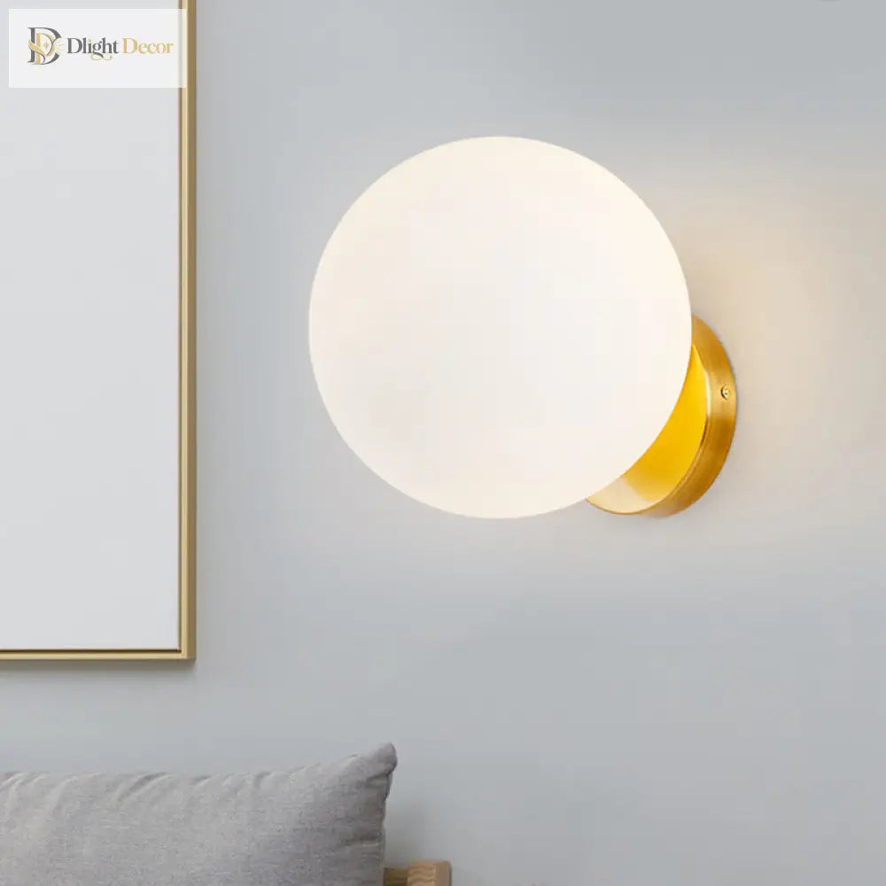 Modern Elegance Meets Warm Illumination: The Gold Opal Glass Wall Sconce