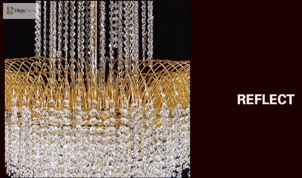 Crystal chandelier featuring hanging clear crystal fringe and gold-tone circular canopy