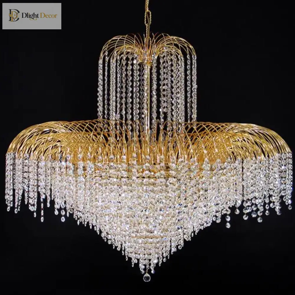 Gold-tone crystal chandelier with multi-tier ring frame and long cascading crystal drops