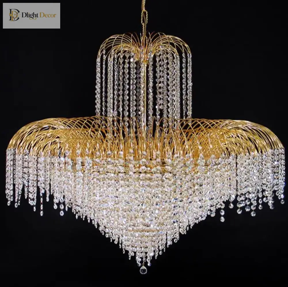Gold-tone crystal chandelier with multi-tier ring frame and long cascading crystal drops