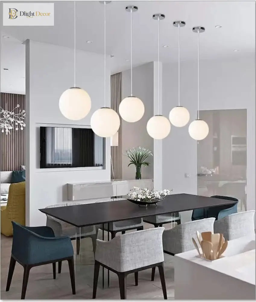 Makayla Elegance Meets Versatility: White Glass Globe Pendant