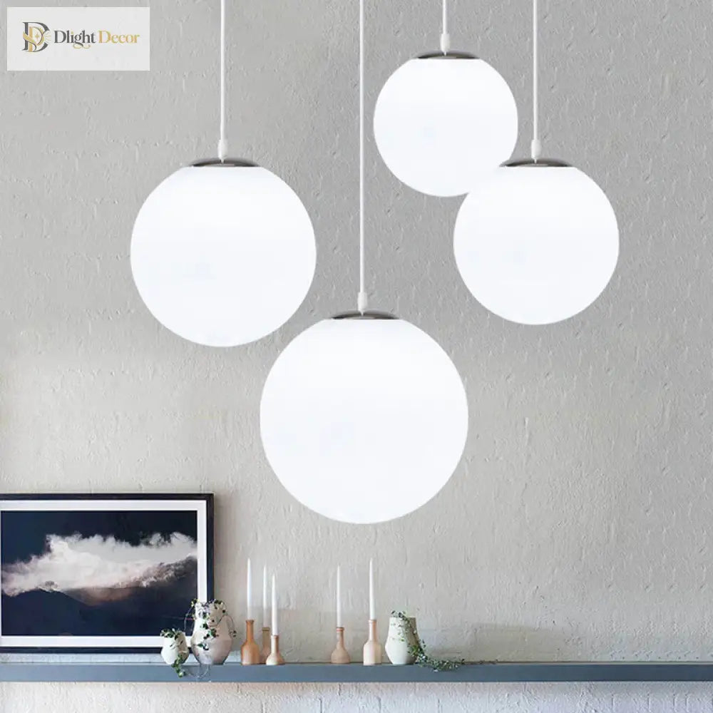 Makayla Elegance Meets Versatility: White Glass Globe Pendant