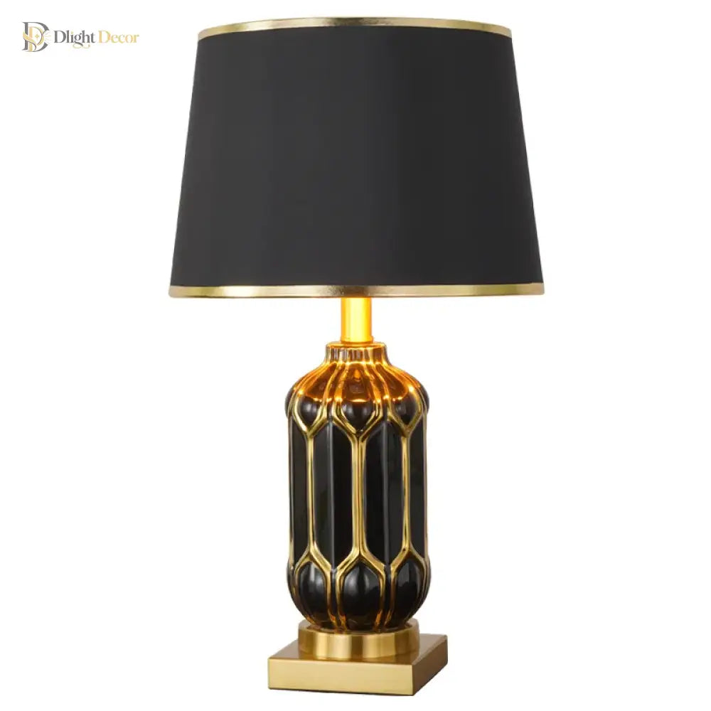 Ceramic LED desk lamp with black shade and dark gold honeycomb ceramic base
