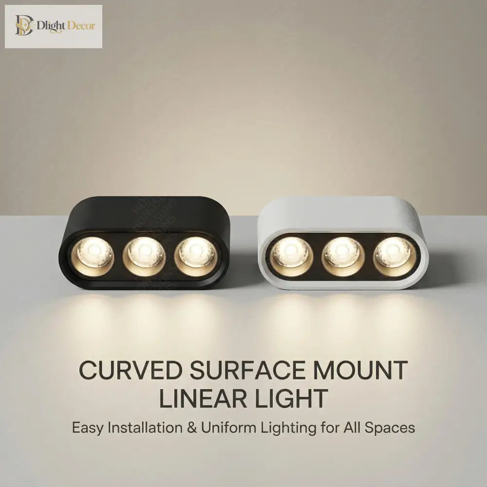 Curved surface-mount linear LED ceiling light, black and white housings with three bulbs