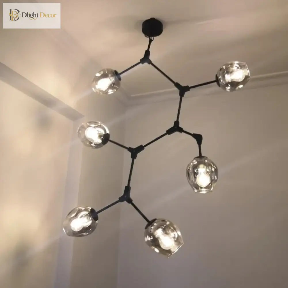 Black molecular glass chandelier with clear glass globe lights, multi-arm ceiling design