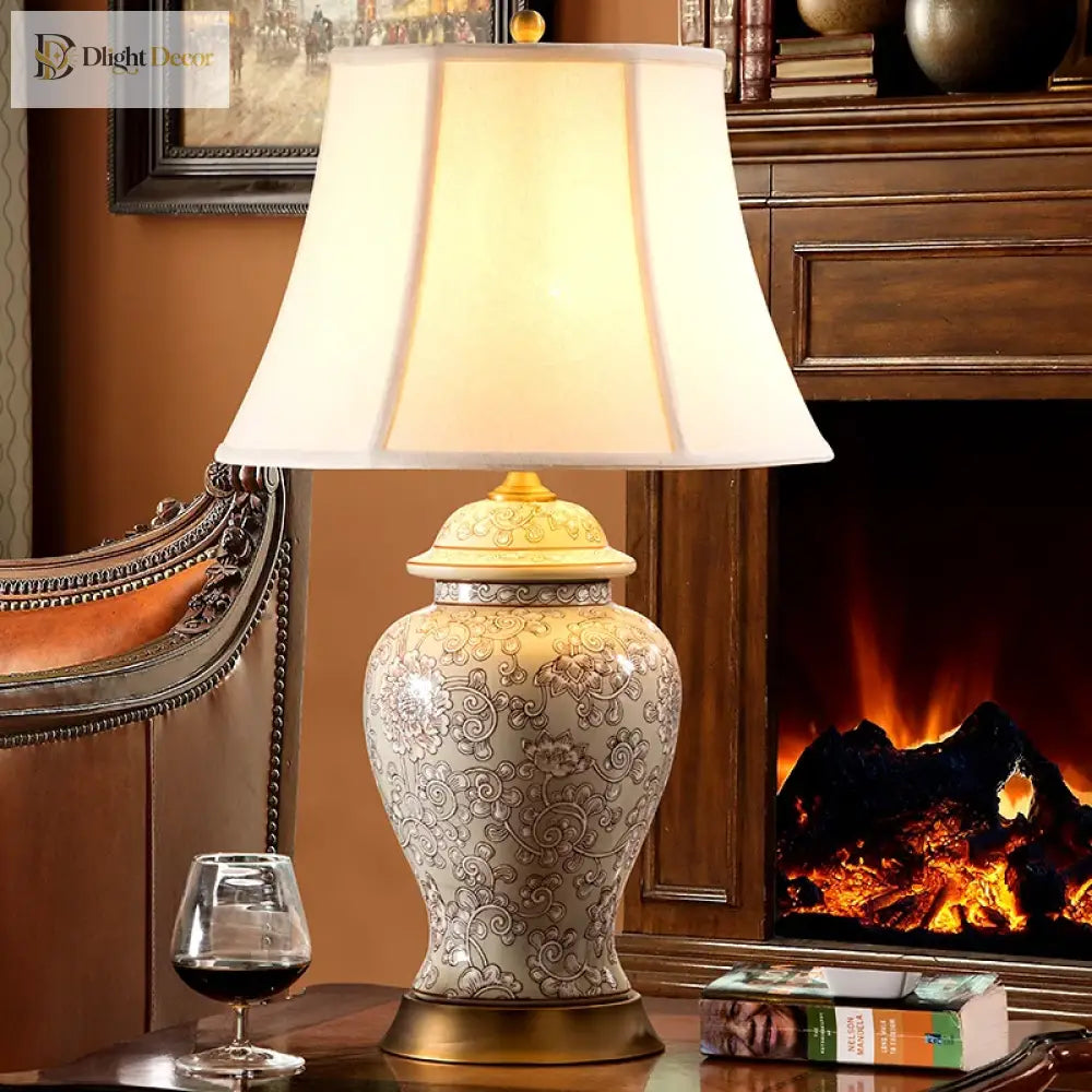 Neoclassical LED desk lamp with ivory shade and ornate floral ceramic body, gold trim