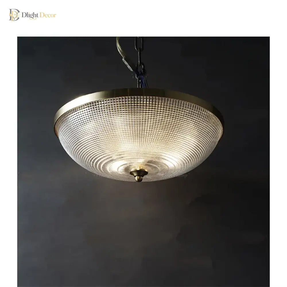 Round flush-mount ceiling light with clear lattice glass shade and gold canopy