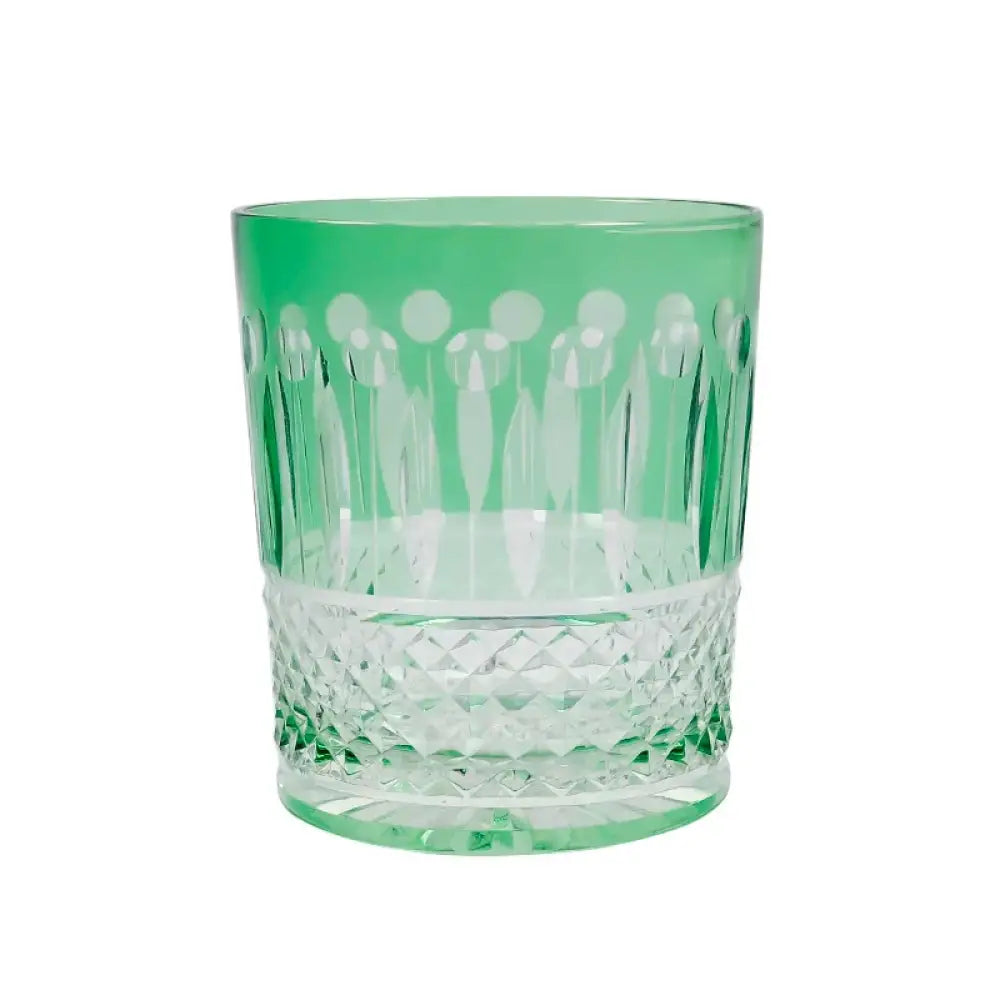 Green diamond-cut crystal whiskey glass with faceted lower section