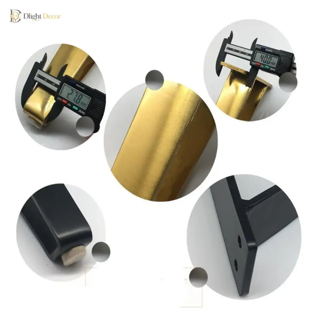 Close-up details of gold and black U-shaped metal furniture legs with end caps