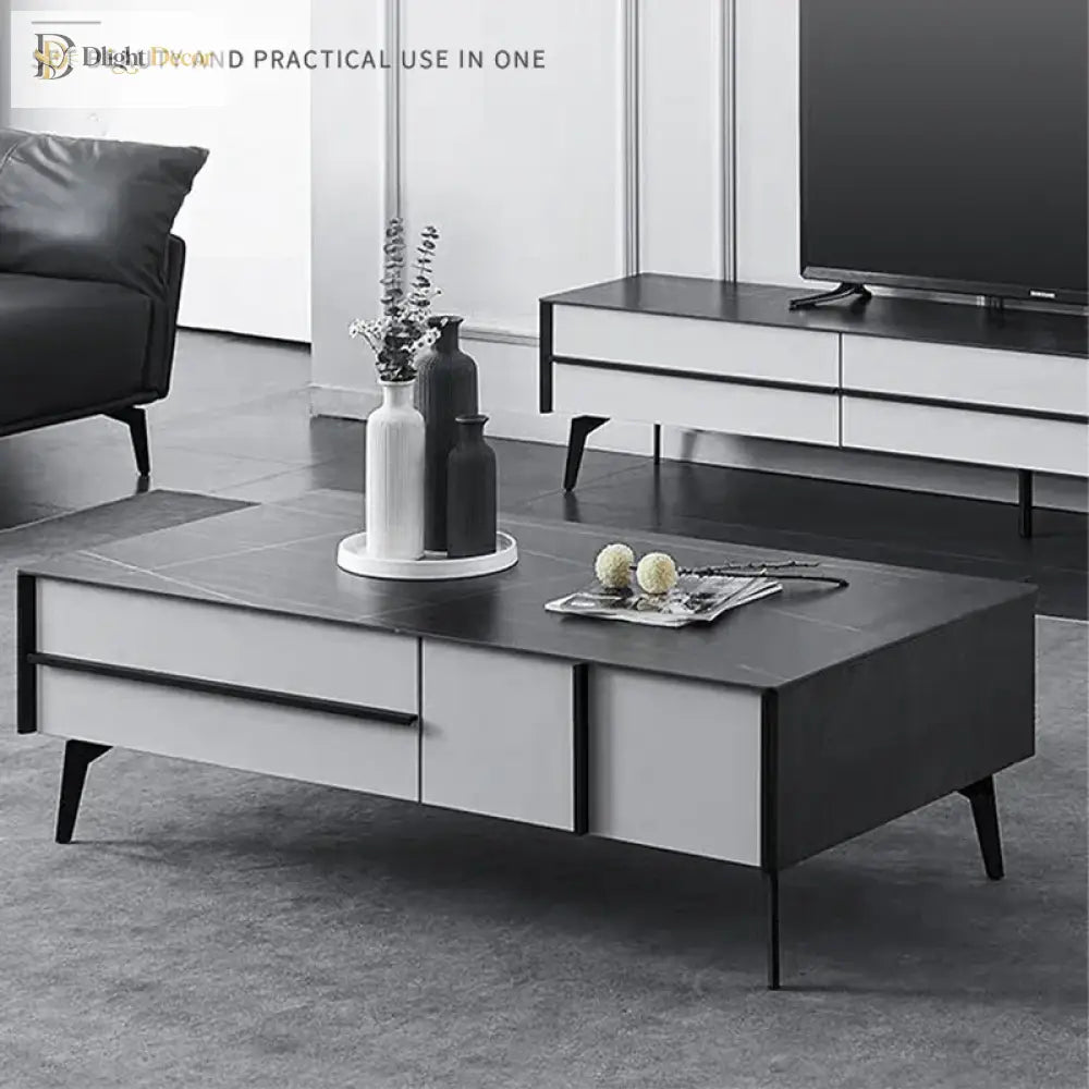 Black metal furniture legs installed under a coffee table with adjustable pads