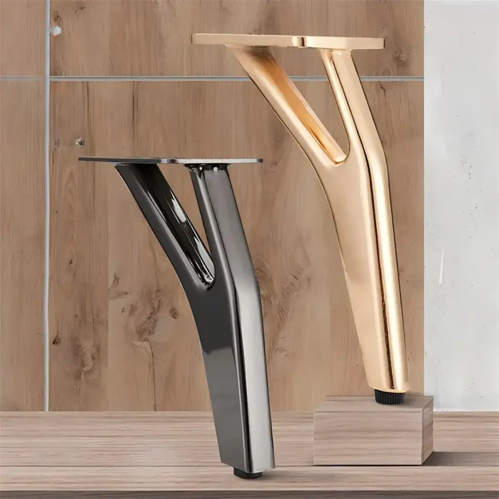 Gold metal Y-shaped furniture leg with curved support and mounting bracket