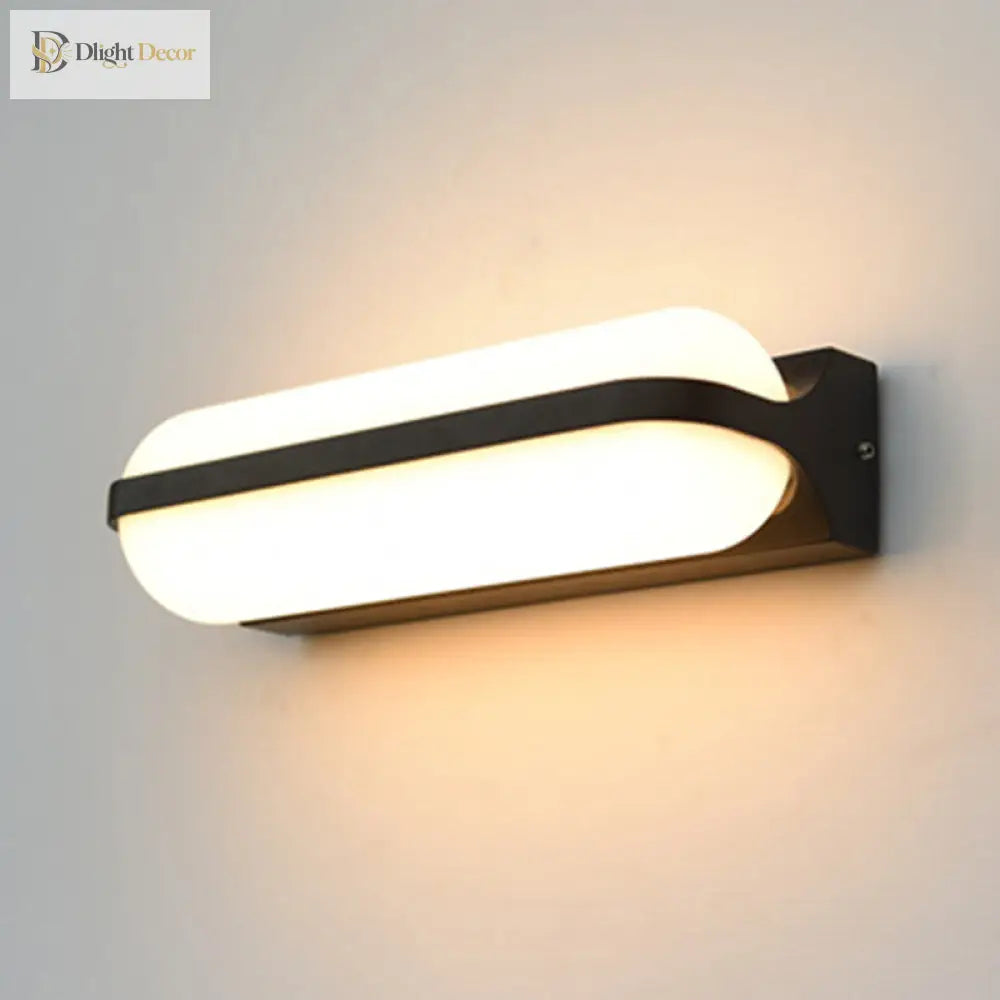Sloane Modern Glow: Black Capsule Wall Sconce