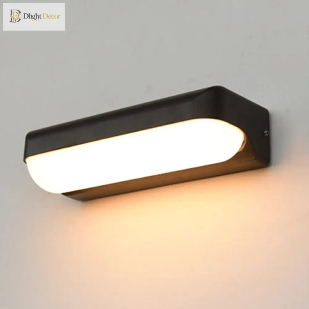 Sloane Modern Glow: Black Capsule Wall Sconce