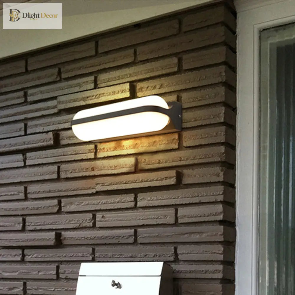 Sloane Modern Glow: Black Capsule Wall Sconce