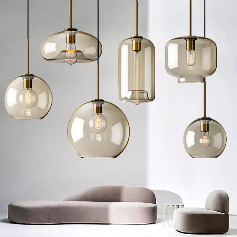 Nordic glass LED pendant lights hanging over a kitchen island