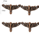 Set of four bronze corner feet with carved fan design and mounting hole areas