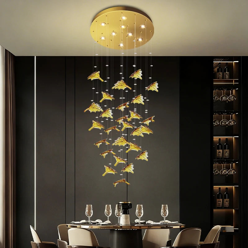 Gold ceiling canopy pendant chandelier with warm lights and hanging gold leaf glass pieces