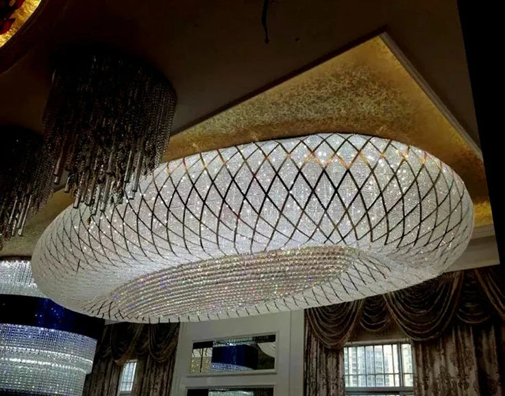 Oval ring-style chandelier with white crystal mesh and dense dangling bead fringe