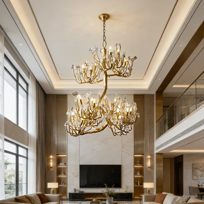 Statement crystal chandelier with gold-toned branch frame and clear prism accents