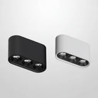 Linear surface-mounted LED ceiling spotlight, black and white housings with three spots