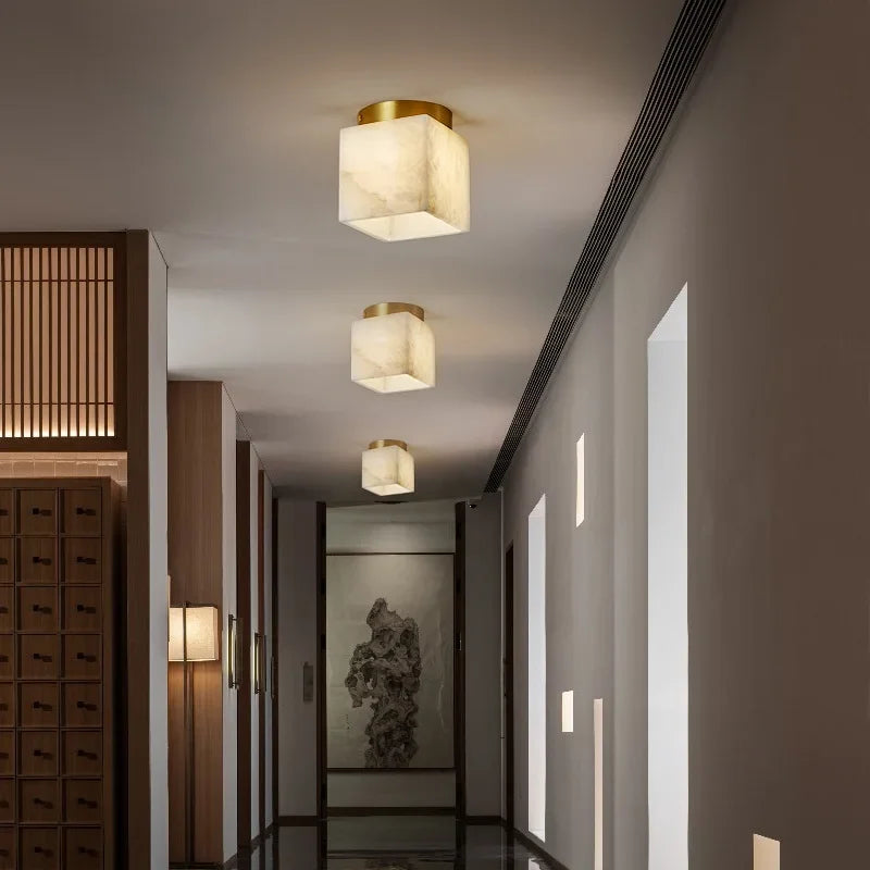 Art deco LED ceiling light with gold copper top and marble-pattern cube shade