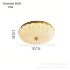 30 cm crystal-style acrylic LED flush-mount ceiling light with scalloped diffuser and brass cap