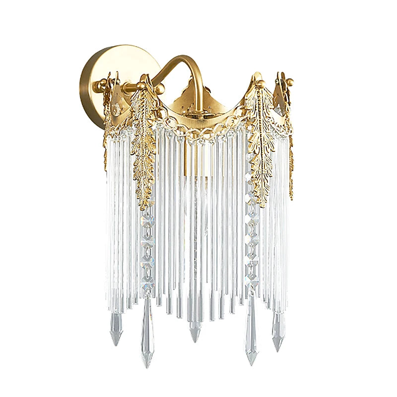 Gold crystal wall sconce with wide round backplate and fringe crystal drops