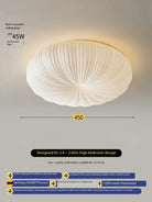 Cream ribbed fabric ceiling light with round dome shade on the ceiling