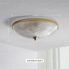 Round flush-mount ceiling light with clear faceted glass shade and gold rim; E27 shown