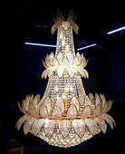 Gold and clear crystal chandelier with tiered lotus design, faceted petals