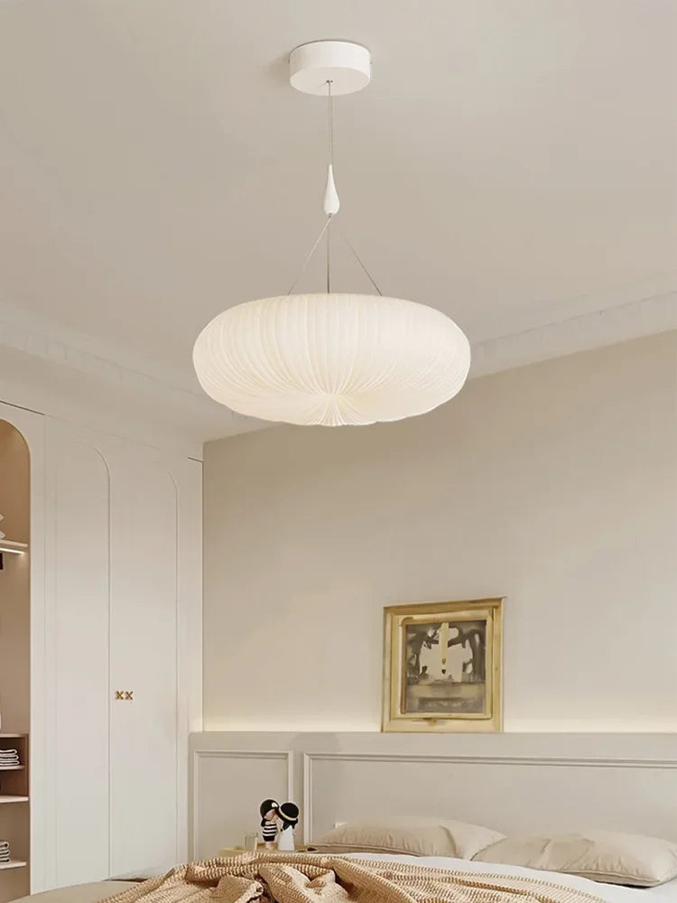 Cream ribbed dome pendant light with white canopy and hanging rod
